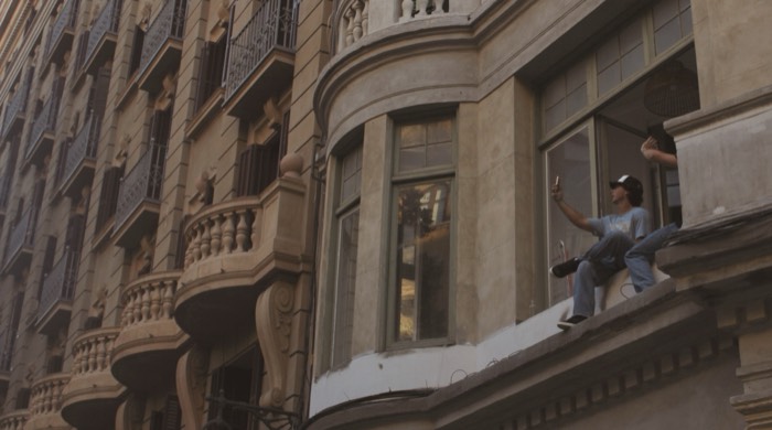 2 dudes chilling on a window, Barcelona. 2026